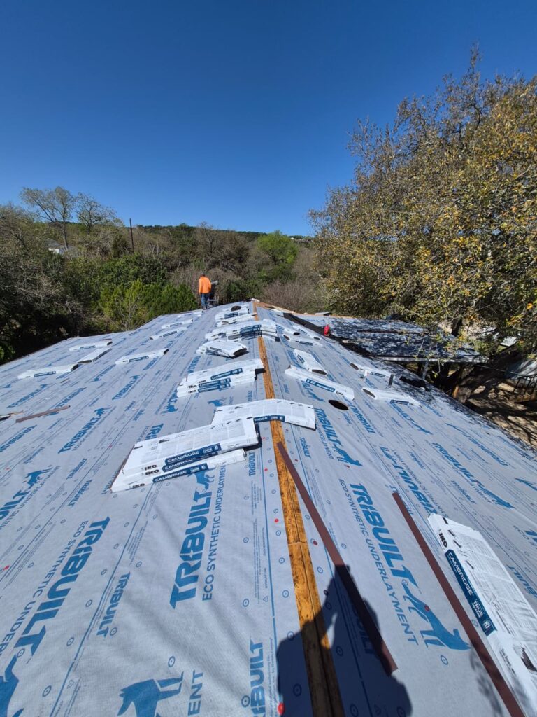 Rush Builders crew at work on a residential roofing project in the Austin area (14-59-02)