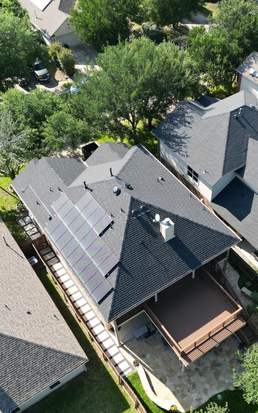 The finished charcoal roof, solar reset, deck untouched