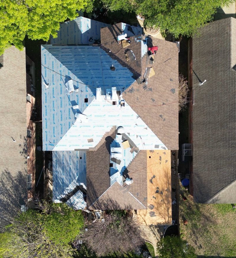 Roof tear-off down to the deck during replacement in Austin area